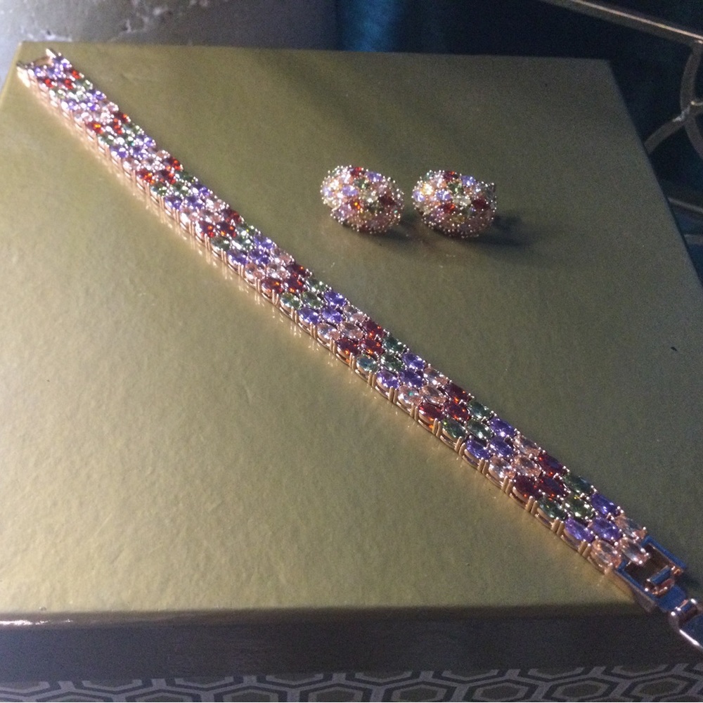 Multi-color, bracelet & earrings. Worn once. Excellent condition.